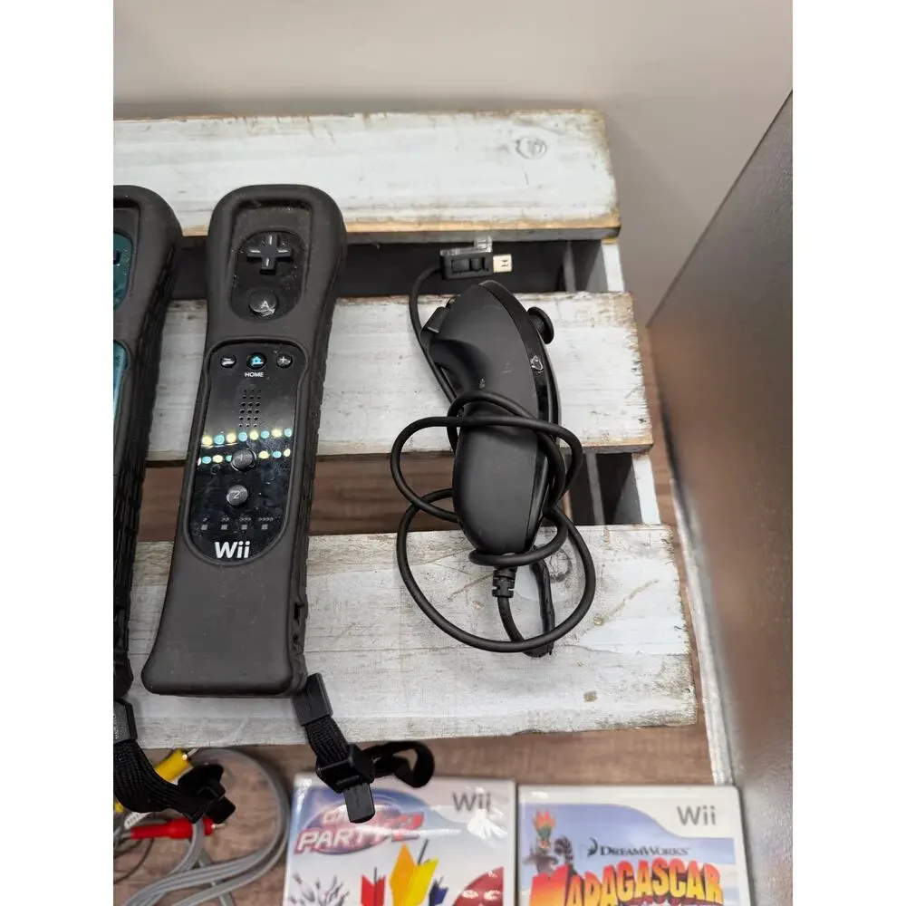 Nintendo Wii Black Console Bundle with 2 Remotes, Nunchuk & 2 Games